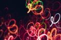 Neon magenta orange lights glowing swirly lines Royalty Free Stock Photo