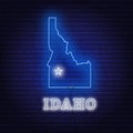 Neon map State of Idaho on a brick wall background Royalty Free Stock Photo