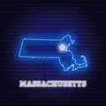 Neon map State of Massachusetts on a brick wall background. Royalty Free Stock Photo