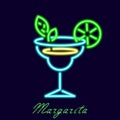Neon margarita cocktail. Long drink drink in luminous glass