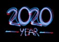 2020 in neon multi colour, parallel lines pattern on black background