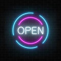 Neon open 24 hours and 7 days in circle frames sign on a brick wall background. Round the clock working store Royalty Free Stock Photo