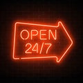 Neon open 24 hours 7 days a week sign in geometric arrow shape on a dark brick wall background. Royalty Free Stock Photo