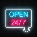 Neon open 24 hours 7 days a week sign in geometric shape with arrow on a brick wall background. Royalty Free Stock Photo