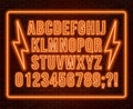 Neon orange font. Bright capital letters with numbers on a dark background. Royalty Free Stock Photo