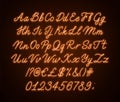 Neon orange script alphabet. Glowing cursive font with letters, numbers and special characters.