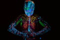 Neon paint creative glowing UV portrait