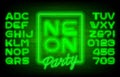 Neon Party alphabet font. Green neon light letters and numbers on brick wall background.