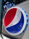 Neon Pepsi Logo on Wall