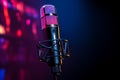 Neon performance microphone illuminated with vibrant and dynamic neon light