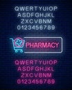 Neon pharmacy glow signboard with medical cross in shopping cart and alphabet. Illuminated drugstore sign open 24 hours Royalty Free Stock Photo