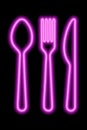 Neon pink shapes of spoon, fork and table khife on a black background. Set of cutlery Royalty Free Stock Photo