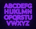 Neon purple alphabet on brick wall background. Capital letter.