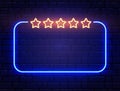 Neon quiz banner on brick wall. Realistic neon frame with five stars. Shining signboard. Star rating. Night bright Royalty Free Stock Photo