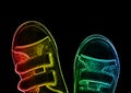 Neon rainbow shoes on black background