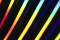 Neon rainbow strips on dark background. Soft focus Abstract rainbow color wave strips horizontal background. Royalty Free Stock Photo