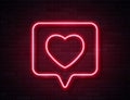 Neon Red Glowing Heart in Spech Bubble Banner on Dark Empty Grunge Brick Background. Royalty Free Stock Photo