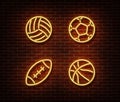 Neon rugby, soccer, basketball, volleyball balls sign vector isolated on brick wall. Sport balls lig