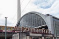 The neon sign of the Alexanderplatz railway station at Alexanderplatz Square in Berlin. Germany. Royalty Free Stock Photo