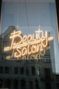 neon sign beauty salon makeup In the window showcase