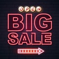 Neon sign big sale open on brick wall background. Vintage electric signboard. Royalty Free Stock Photo