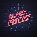 Neon sign black friday big sale open on brick wall background. Royalty Free Stock Photo