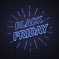 Neon sign black friday big sale open on brick wall background. Royalty Free Stock Photo