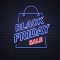 Neon sign black friday big sale open on brick wall background. Royalty Free Stock Photo