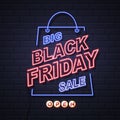 Neon sign black friday big sale open on brick wall background. Royalty Free Stock Photo