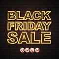 Neon sign black friday sale open on brick wall background. Royalty Free Stock Photo