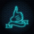 Neon sign with blue glow. Hand gesture, thumb up. like. On a brick wall background, for your design. With ribbon, flag