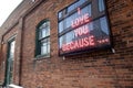 Neon sign on a brick wall. Love concept Royalty Free Stock Photo