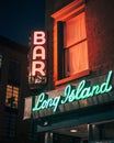 A neon sign on a building, Cobble Hill, Brooklyn, New York