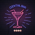 Neon sign cocktail bar on brick wall background. Vintage electric signboard Royalty Free Stock Photo