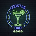 Neon sign cocktail bar on brick wall background. Vintage electric signboard Royalty Free Stock Photo