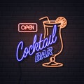 Neon sign cocktail bar on brick wall background. Vintage electric signboard Royalty Free Stock Photo