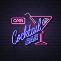 Neon sign cocktail bar on brick wall background. Vintage electric signboard Royalty Free Stock Photo