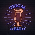 Neon sign cocktail bar on brick wall background. Vintage electric signboard Royalty Free Stock Photo