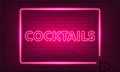 Neon sign Cocktails with glass in frame on brick wall background. Vintage pink electric signboard with bright neon lights. Drink Royalty Free Stock Photo