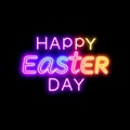 Neon sign with Happy Easter Day text in vibrant colors against a black background image Royalty Free Stock Photo
