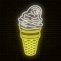 Neon sign in the form of an ice cream cone. Against a brick wall. Isolated. Royalty Free Stock Photo