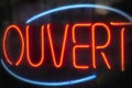 Neon sign french open glowing light ouvert