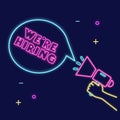 Neon sign of Hand holding megaphone - We are hiring. illustration.. Bright neon light illustration of We are hiring