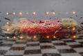 Neon Sign Neon Hot Rod Sign in wet window with vintage hot rod car in background Royalty Free Stock Photo