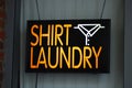 A neon sign of the laundry shop