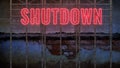 Neon sign with message SHUTDOWN on dark shady background