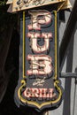 Sign over the tavern, pub and grill