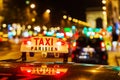 Neon sign of a Parisian taxi