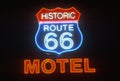A neon sign that reads Ã¯Â¿Â½Historic Route 66 MotelÃ¯Â¿Â½ Royalty Free Stock Photo