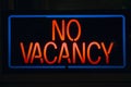 Neon sign reads Ã¯Â¿Â½No VacancyÃ¯Â¿Â½ for a motel at night Royalty Free Stock Photo